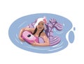 Girl in a panama hat swims in an inflatable circle in the form of a fish